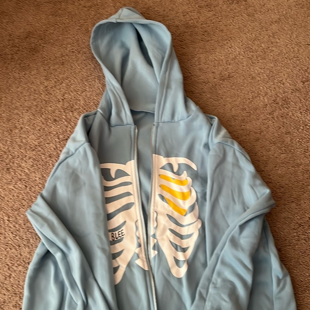 beating heart sky blue zipup